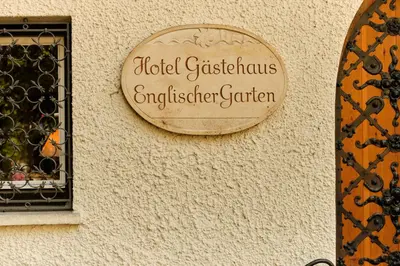 Ein Zertifikat, Auszeichnung, Logo oder anderes Dokument, das in der Unterkunft Gästehaus Englischer Garten ausgestellt ist