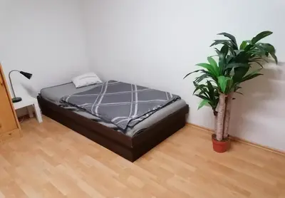 Ein Bett oder Betten in einem Zimmer der Unterkunft 10 min nach Augsburg - Apartment mit Extra-Eingang