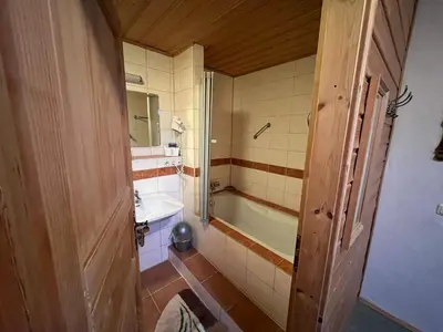 Ein Badezimmer in der Unterkunft Pension Huber