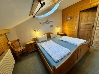 Ein Bett oder Betten in einem Zimmer der Unterkunft Pension Huber