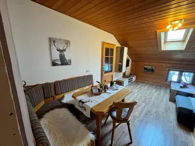 Ein Sitzbereich in der Unterkunft Pension Huber
