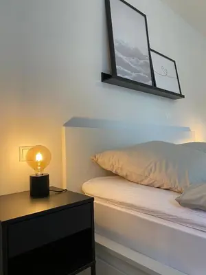 Ein Bett oder Betten in einem Zimmer der Unterkunft Ferienwohnung Niederbuchner