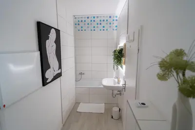 Ein Badezimmer in der Unterkunft HappyPlace - großzügige Ferienwohnung im Zentrum