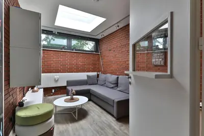Ein Sitzbereich in der Unterkunft Ferienwohnung nahe A8 Augsburg München Ulm - Stillblick