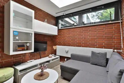 Ein Sitzbereich in der Unterkunft Ferienwohnung nahe A8 Augsburg München Ulm - Stillblick