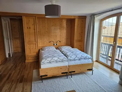Ein Bett oder Betten in einem Zimmer der Unterkunft Ferienwohnung Rebensburg