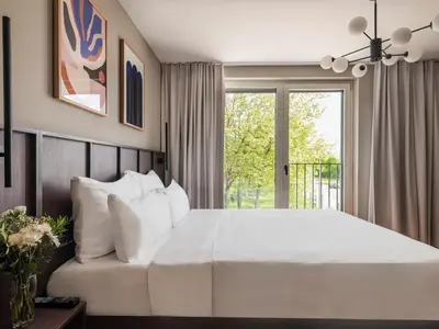 Ein Bett oder Betten in einem Zimmer der Unterkunft Numa Munich Obersendling