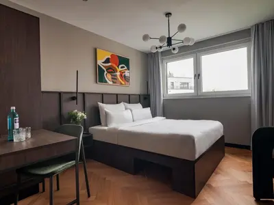 Ein Bett oder Betten in einem Zimmer der Unterkunft Numa Munich Obersendling