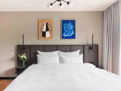Ein Bett oder Betten in einem Zimmer der Unterkunft Numa Munich Obersendling