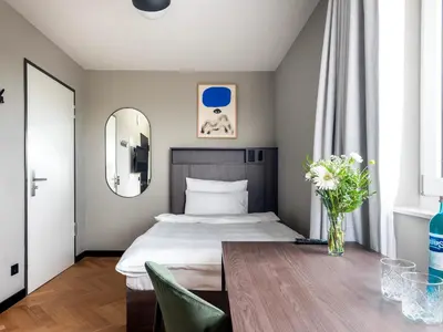 Ein Bett oder Betten in einem Zimmer der Unterkunft Numa Munich Obersendling