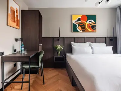 Ein Bett oder Betten in einem Zimmer der Unterkunft Numa Munich Obersendling