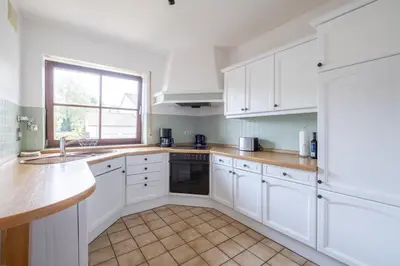 Küche/Küchenzeile in der Unterkunft Gemütliches Wohlfühl-Apartment mit perfektem Seeblick