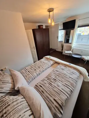 Ein Bett oder Betten in einem Zimmer der Unterkunft Ferienwohnung Ambiente