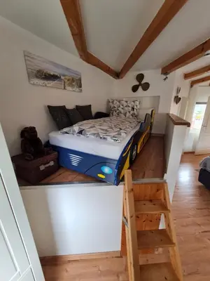 Ein Bett oder Betten in einem Zimmer der Unterkunft Ferienwohnung Ambiente