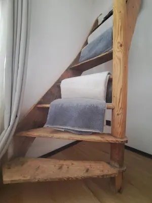 Ein Etagenbett oder Etagenbetten in einem Zimmer der Unterkunft Exklusives STALL-LOFT 