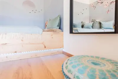 Ein Bett oder Betten in einem Zimmer der Unterkunft Exklusives Design-Apartment & Sauna