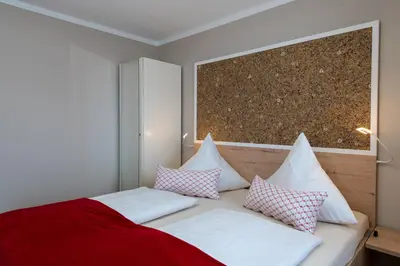 Ein Bett oder Betten in einem Zimmer der Unterkunft Gästehaus Nigglhof