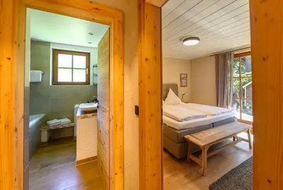 Ein Bett oder Betten in einem Zimmer der Unterkunft Alpenluft II
