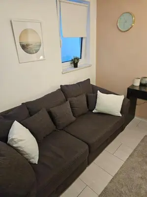 Ein Sitzbereich in der Unterkunft Schönes Apartment in München