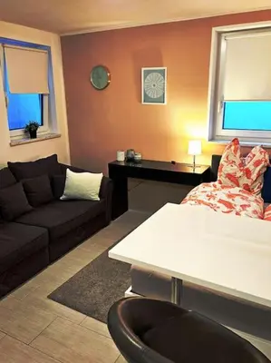 Ein Sitzbereich in der Unterkunft Schönes Apartment in München