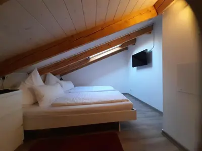 Ein Bett oder Betten in einem Zimmer der Unterkunft Ferienwohnung an der Singold