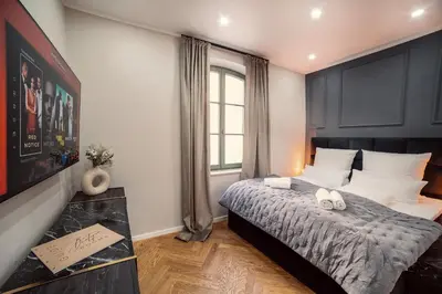 Ein Bett oder Betten in einem Zimmer der Unterkunft NEW LUXUS Suite I TWO Kingbeds I Center