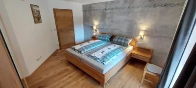 Ein Bett oder Betten in einem Zimmer der Unterkunft Ferienwohnung Leni