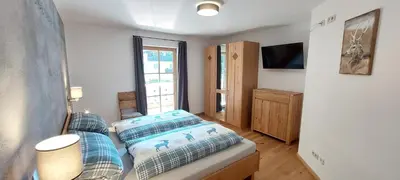 Ein Bett oder Betten in einem Zimmer der Unterkunft Ferienwohnung Leni