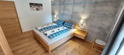 Ein Bett oder Betten in einem Zimmer der Unterkunft Ferienwohnung Leni