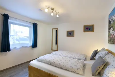 Ein Bett oder Betten in einem Zimmer der Unterkunft Bergleuchten