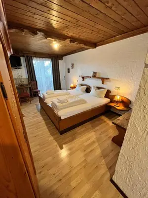Ein Bett oder Betten in einem Zimmer der Unterkunft Hotel Negele