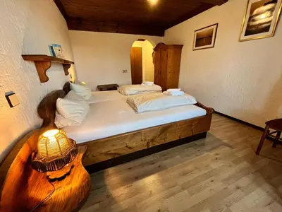 Ein Bett oder Betten in einem Zimmer der Unterkunft Hotel Negele