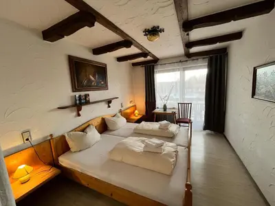 Ein Bett oder Betten in einem Zimmer der Unterkunft Hotel Negele