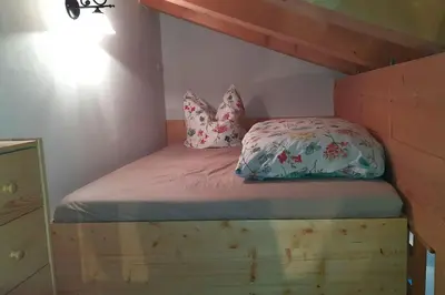 Ein Bett oder Betten in einem Zimmer der Unterkunft Bauernhof Auerhof Ferienwohnung