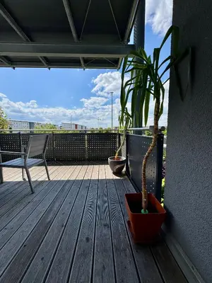 Ein Balkon oder eine Terrasse in der Unterkunft Moderne Wohnung 100 m2 mit Büro und Terrasse