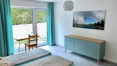 Ein Bett oder Betten in einem Zimmer der Unterkunft Ammerseeidylle im Herzen von Dießen