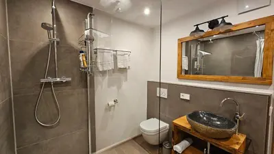 Ein Badezimmer in der Unterkunft Steingaden-Urspring Ferienwohnung Bergzeit im Fuchsbau