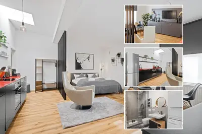 Ein Sitzbereich in der Unterkunft Stylish Tiny City House