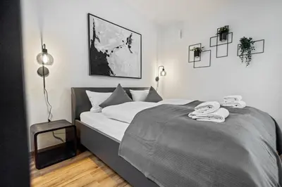 Ein Bett oder Betten in einem Zimmer der Unterkunft Stylish Tiny City House