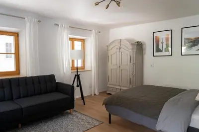 Ein Bett oder Betten in einem Zimmer der Unterkunft Ferienwohnung am Siglhof