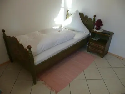 Ein Bett oder Betten in einem Zimmer der Unterkunft Landhaus Caesar - Hotel Garni