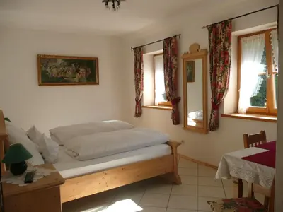 Ein Bett oder Betten in einem Zimmer der Unterkunft Landhaus Caesar - Hotel Garni