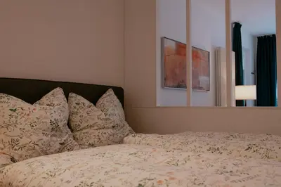 Ein Bett oder Betten in einem Zimmer der Unterkunft Charmante Ferienwohnung in der Altstadt