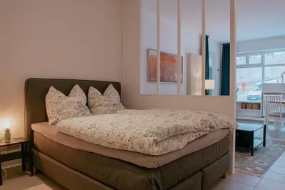 Ein Bett oder Betten in einem Zimmer der Unterkunft Charmante Ferienwohnung in der Altstadt