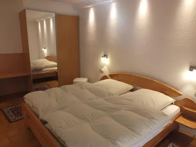 Ein Bett oder Betten in einem Zimmer der Unterkunft Ferienwohnung Jersemann