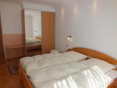 Ein Bett oder Betten in einem Zimmer der Unterkunft Ferienwohnung Jersemann