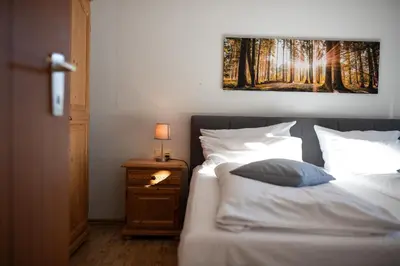 Ein Bett oder Betten in einem Zimmer der Unterkunft Alpenhimmel