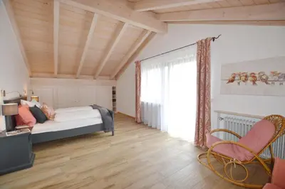 Ein Bett oder Betten in einem Zimmer der Unterkunft ChiemseeZeit