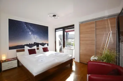 Ein Bett oder Betten in einem Zimmer der Unterkunft Alpenperle