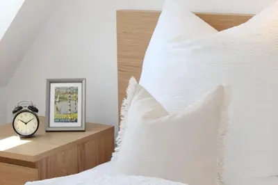 Ein Bett oder Betten in einem Zimmer der Unterkunft Schloss Winkl